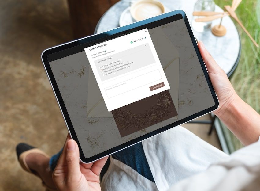 How to respond to a RSVP: person submitting an RSVP using a tablet