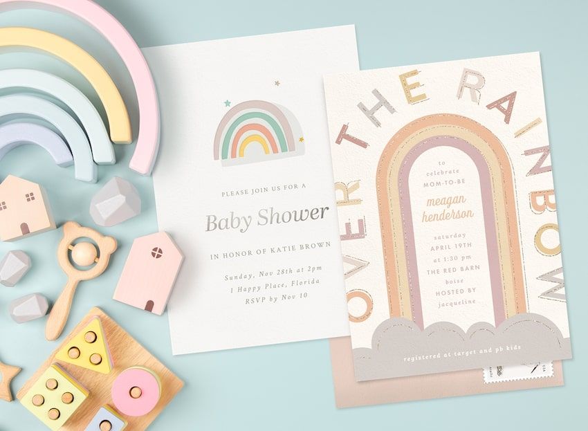 Rainbow baby shower invitations and some baby toys
