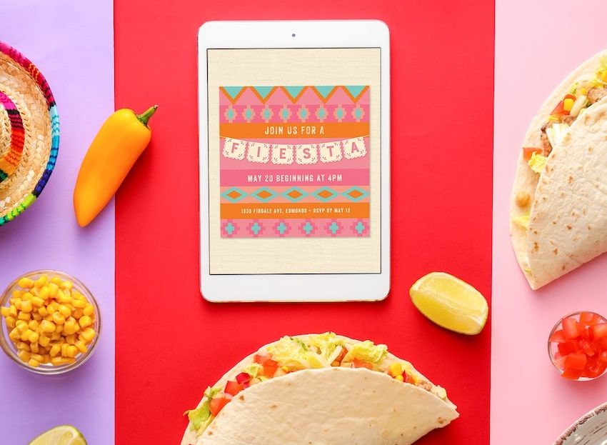 Fiesta invitations: tablet and various food on a table