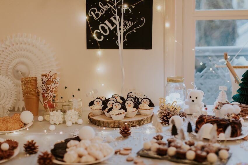 Winter wonderland baby shower: various desserts on a table